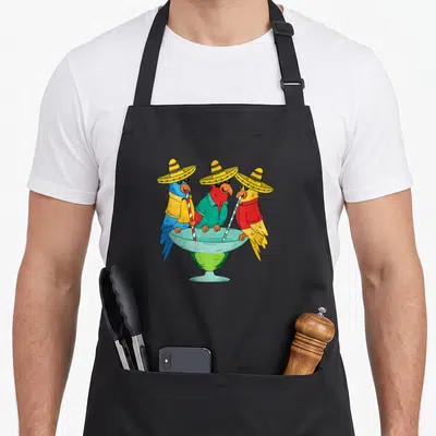 Parrot mexican apron - Three parrots in sombreros and shirts sipping from a large teal cocktail glass with striped — shown on a black cotton canvas apron against a white background