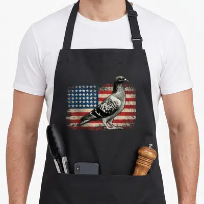 Pigeon 4th of july apron - Realistic grey pigeon standing in front of a distressed red white and blue American flag — shown on a black cotton canvas apron against a white background