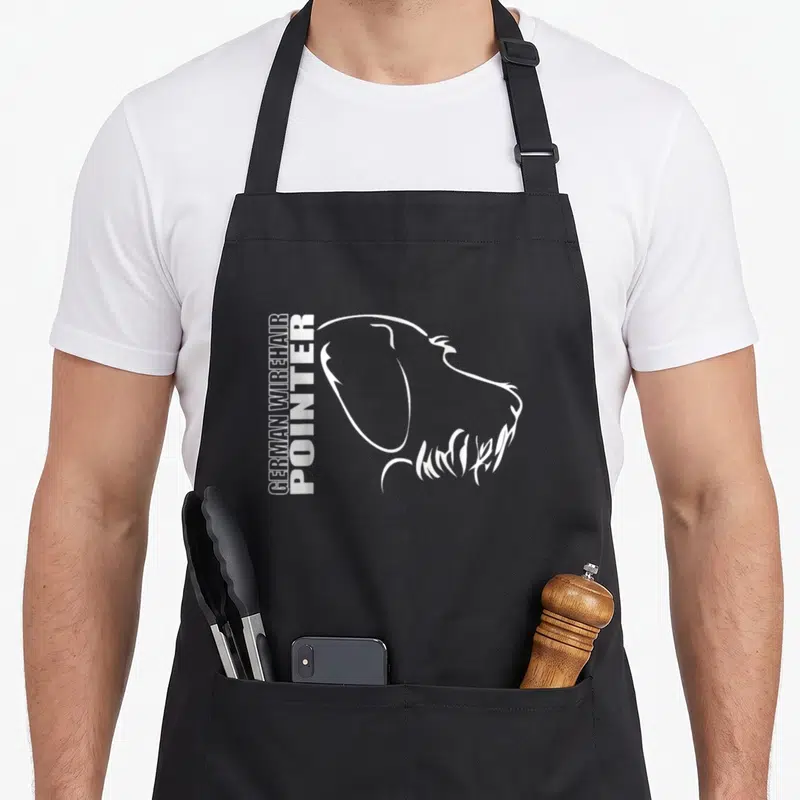 Wirehair pointer apron - White line art German Wirehair Pointer profile with vertical text on black fabric — shown on a black cotton canvas apron against a white background
