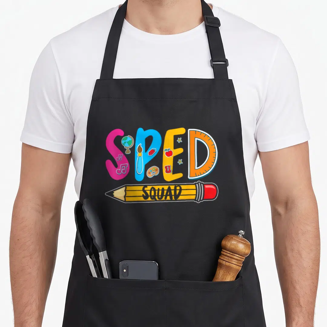 Sped squad personalized teacher aprons - Colorful SPED letters with school icons and a SQUAD pencil graphic — shown on a black cotton canvas apron against a white background