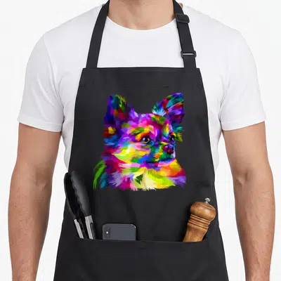Hair custom dog apron - Multicolored cartoon chihuahua head in pop art style with blue pink yellow green purple fur — shown on a black cotton canvas apron against a white background