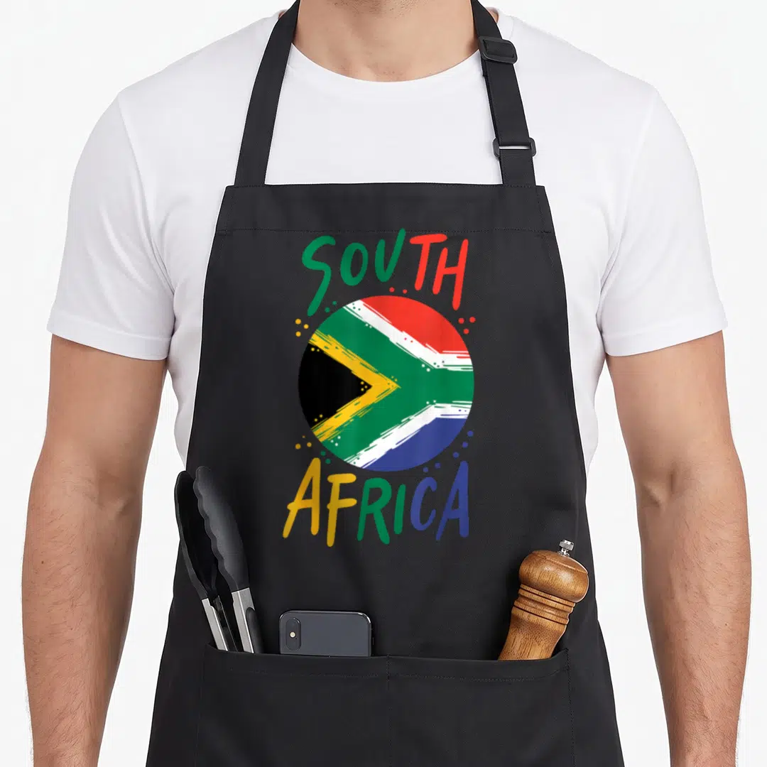 Africa flag south african apron - Retro circular South African flag in red green blue and yellow with arched text — shown on a black cotton canvas apron against a white background