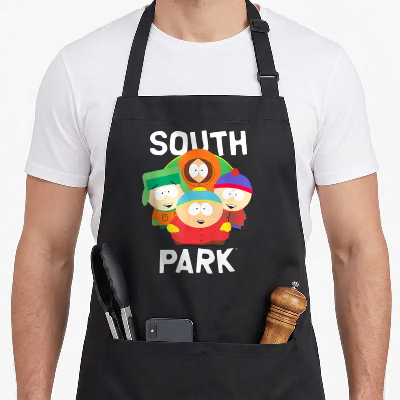 Gang stan apron - Four cartoon children in winter hats and coats with white text above and below — shown on a black cotton canvas apron against a white background