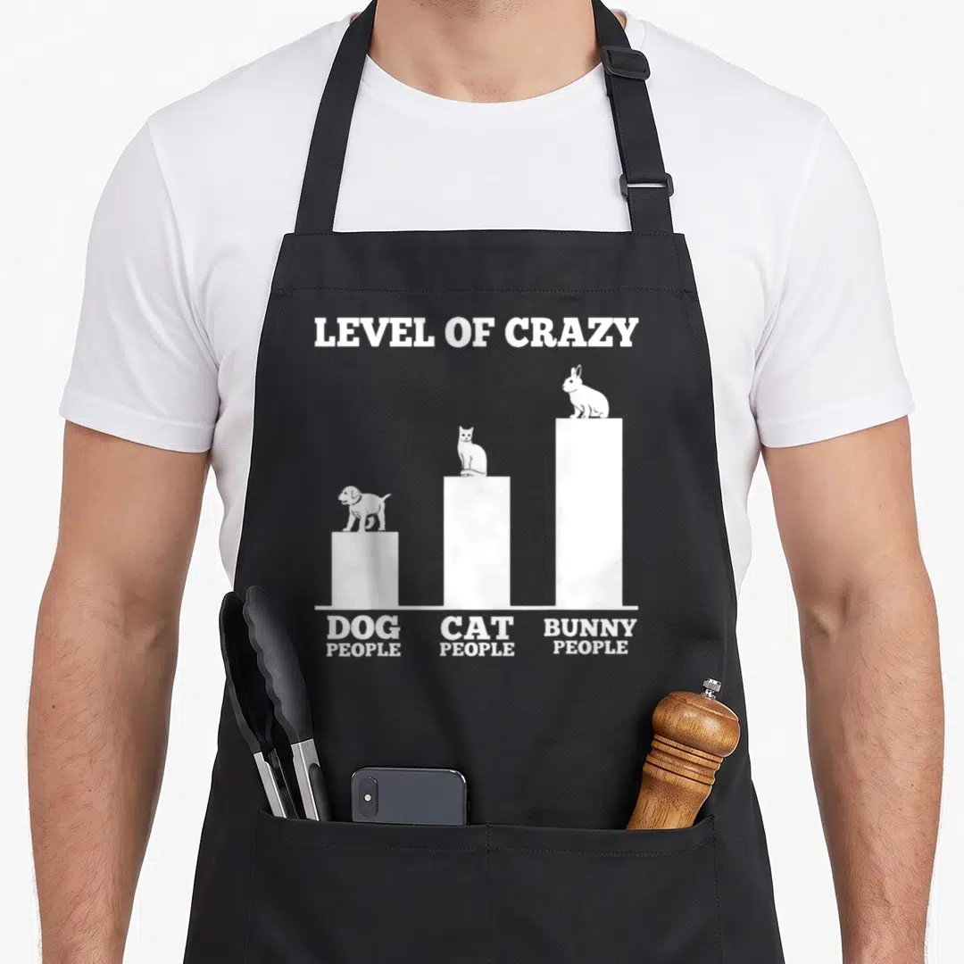 Outfit rabbit bunny apron - White bar chart with dog cat and bunny silhouettes labeled dog people cat people bunny — shown on a black cotton canvas apron against a white background
