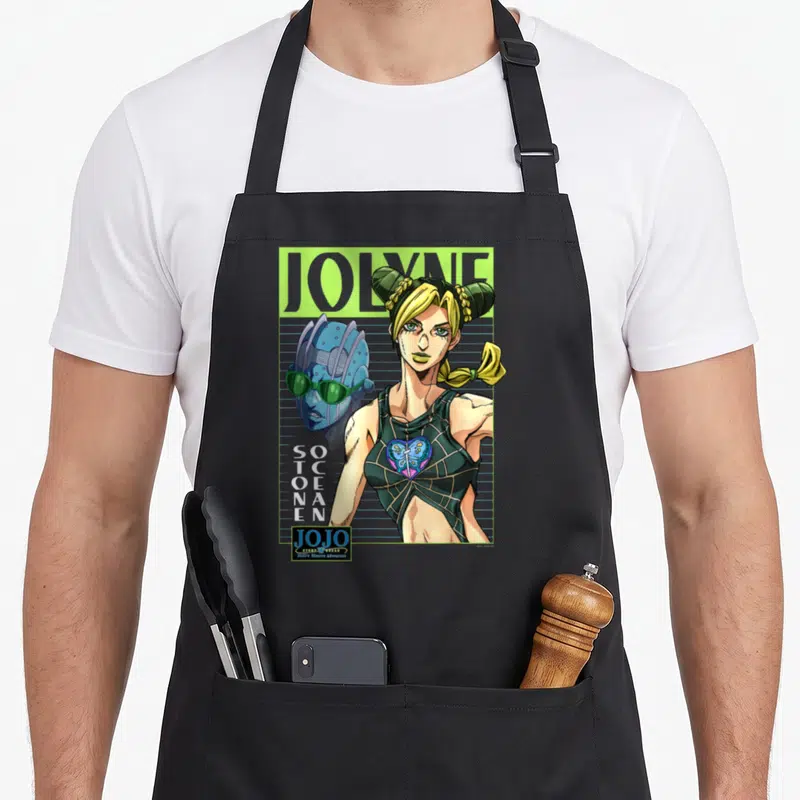 Jolyne anime apron - JOLYNE text, blonde woman, blue head, vertical SOTCENAE text, green accents, JOJO logo — shown on a black cotton canvas apron against a white background