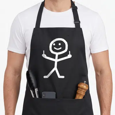 Stick funny b apron - White stick figure line art showing two middle fingers with a smiling face — shown on a black cotton canvas apron against a white background