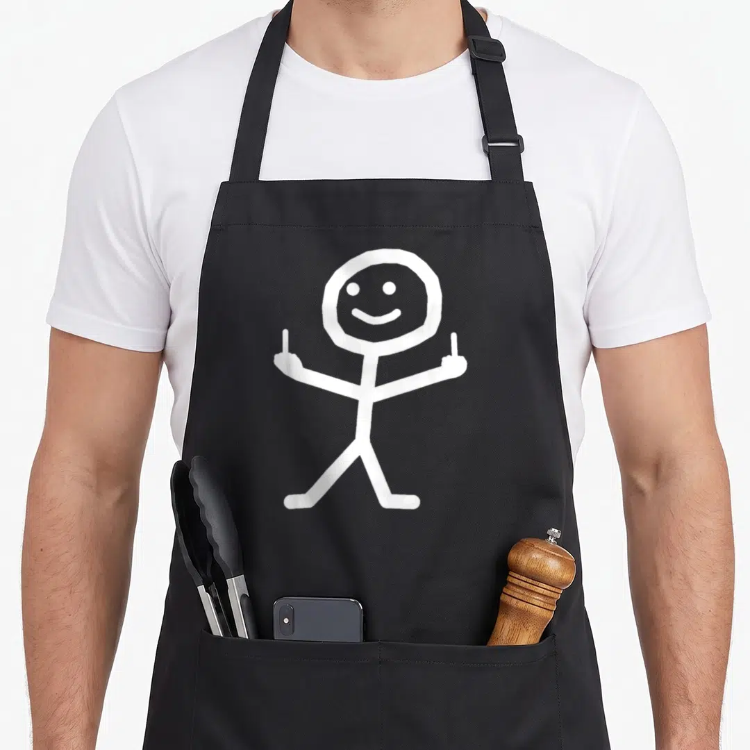 Stick funny b apron - White stick figure line art showing two middle fingers with a smiling face — shown on a black cotton canvas apron against a white background