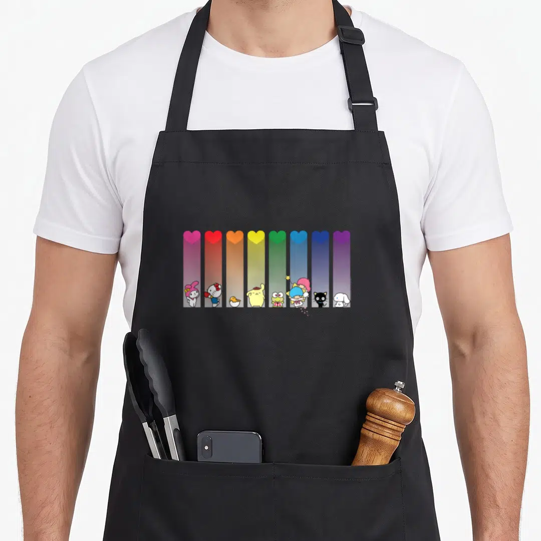 Cute rainbow friends apron - Eight colorful hearts with gradients above standing Sanrio characters in cartoon style — shown on a black cotton canvas apron against a white background