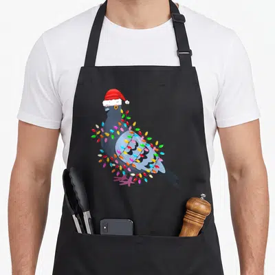 Pigeon christmas lights apron - Grey cartoon pigeon in red hat wrapped in multicolored christmas light bulbs — shown on a black cotton canvas apron against a white background