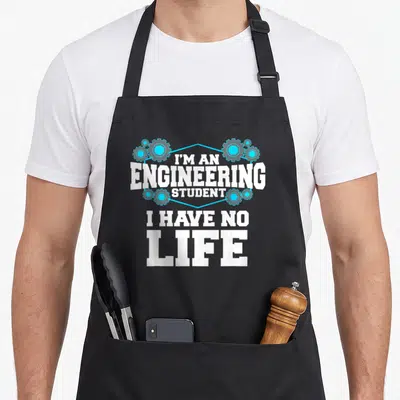 Engineer student engineering apron - White text I'm An Engineering Student I Have No Life framed by blue gears — shown on a black cotton canvas apron against a white background
