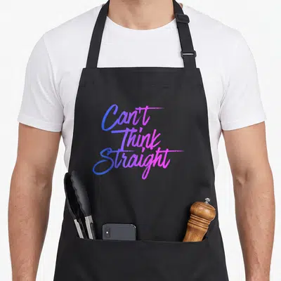 Straight pride apron - Can't Think Straight script text in blue purple pink gradient — shown on a black cotton canvas apron against a white background