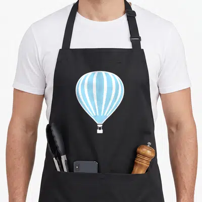 Vintage hot balloon apron - Minimalist light blue and white hot air balloon graphic centered on grey background — shown on a black cotton canvas apron against a white background