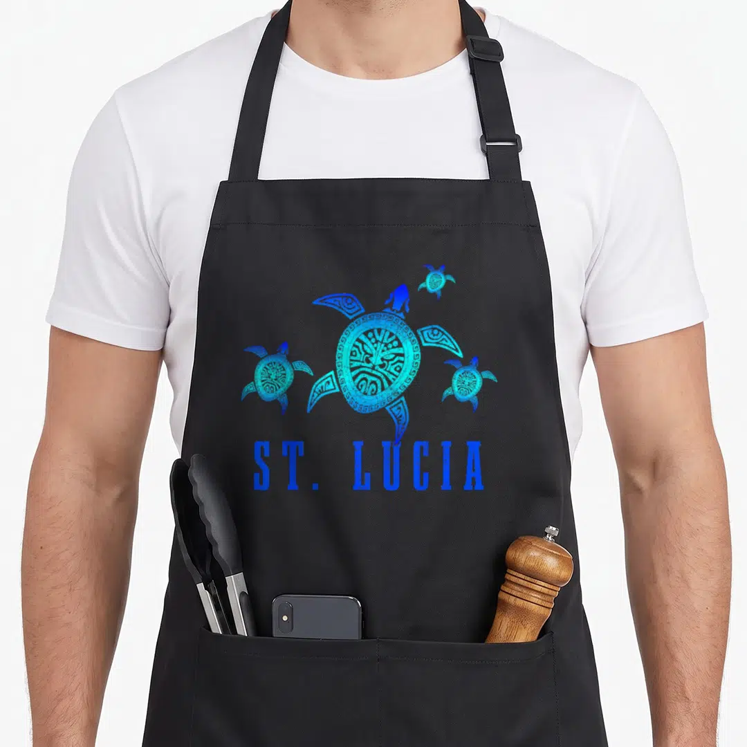 Saint tortoise lady apron - Three blue line-art sea turtles swimming above centered ST. LUCIA text — shown on a black cotton canvas apron against a white background