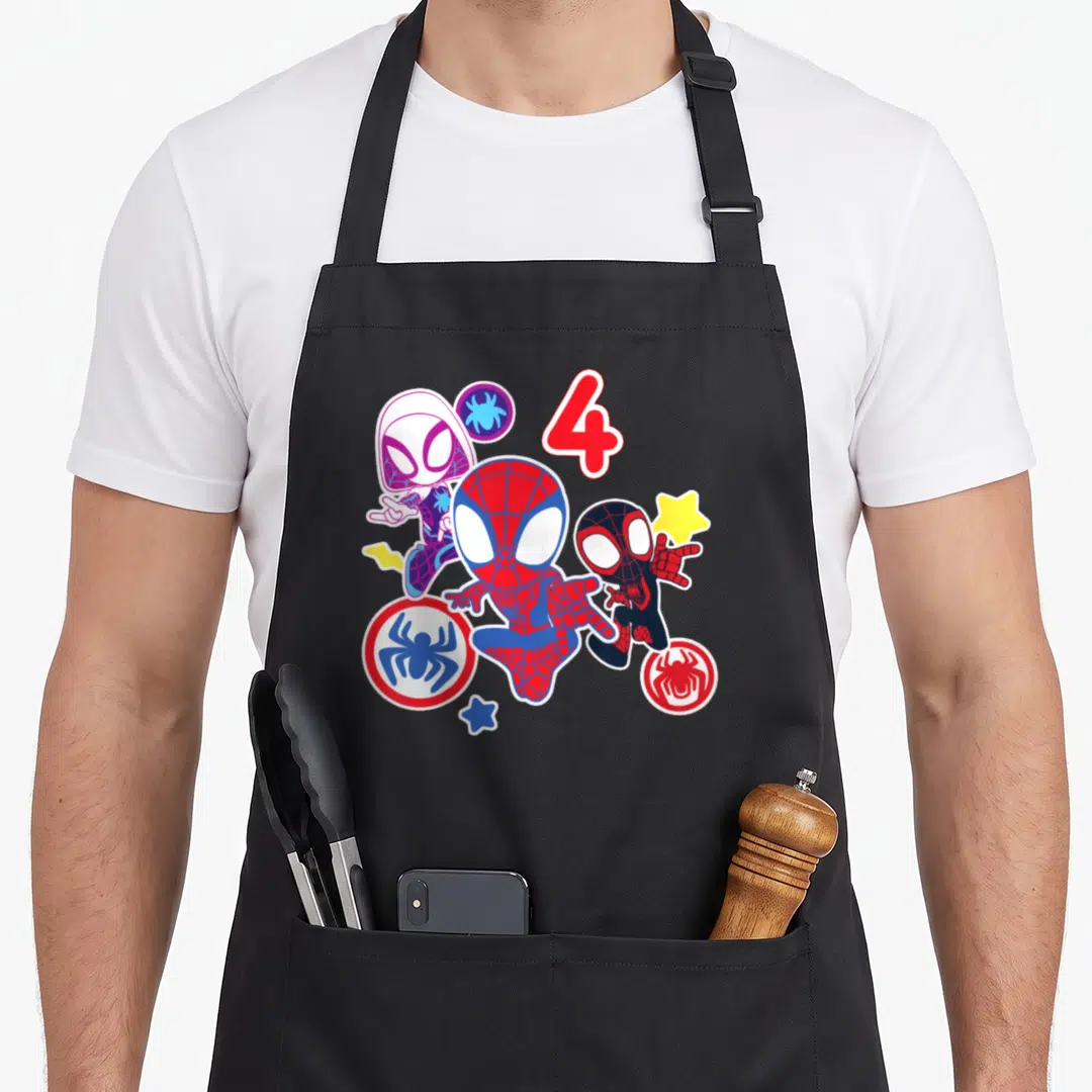 Spidey best friend aprons - Red number 4 above three cartoon Spider-Man characters with stars and spider logos — shown on a black cotton canvas apron against a white background