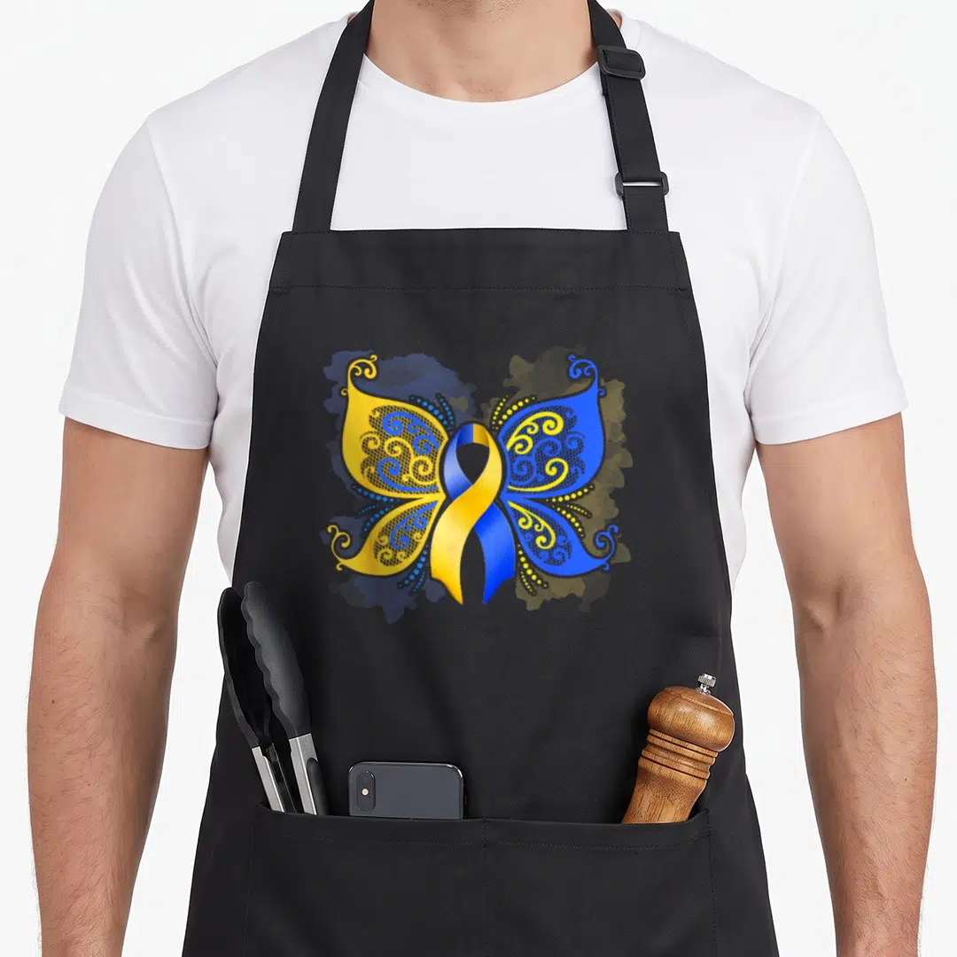 Syndrome butterfly apron - Blue and yellow awareness ribbon butterfly with swirls and dots — shown on a black cotton canvas apron against a white background