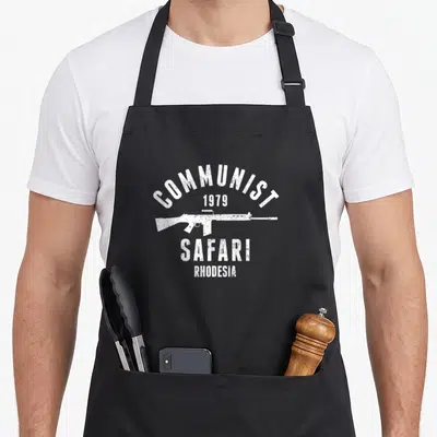 Communist infantry apron - White distressed rifle and text reading COMMUNIST 1979 SAFARI RHODESIA — shown on a black cotton canvas apron against a white background