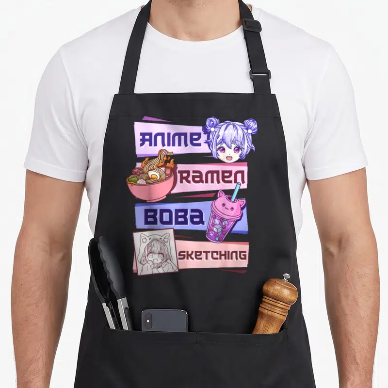 Ramen boba anime apron - Stacked purple pink blue banners with anime girl ramen bowl boba cup and sketch illustration — shown on a black cotton canvas apron against a white background