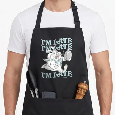 Late alice wonderland apron - White Rabbit holding pocket watch with I'M LATE text in light blue and grey cartoon style — shown on a black cotton canvas apron against a white background