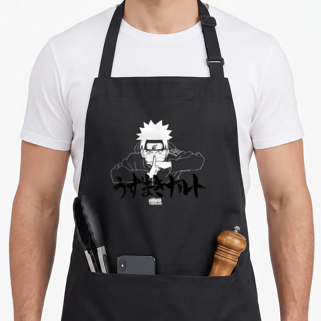 Linear anime apron - White line-art portrait of Naruto with black Japanese text and small logo centered on front panel — shown on a black cotton canvas apron against a white background