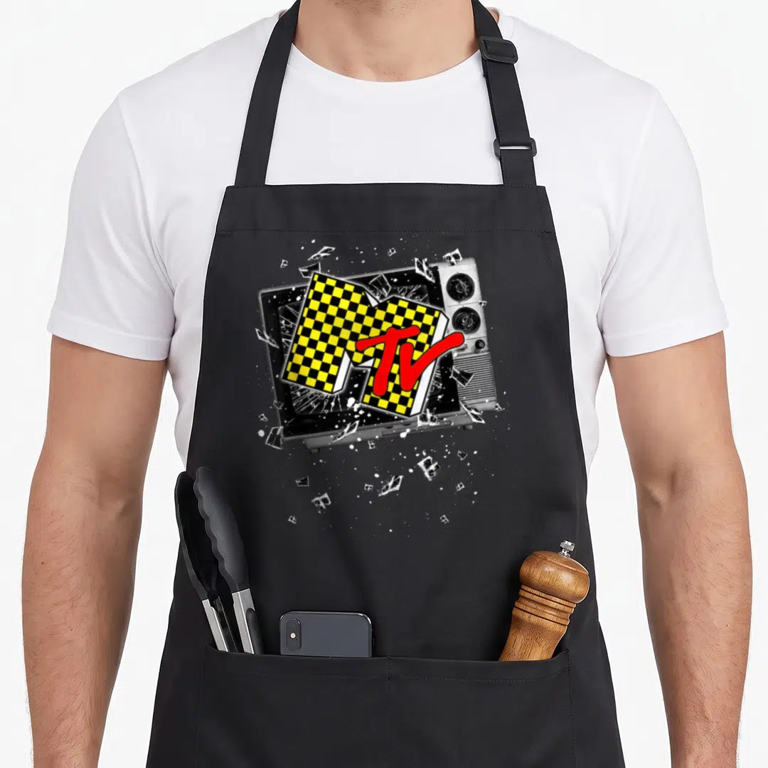 Checker mtv apron - Retro TV shattering with black yellow checkered logo and red TV text — shown on a black cotton canvas apron against a white background