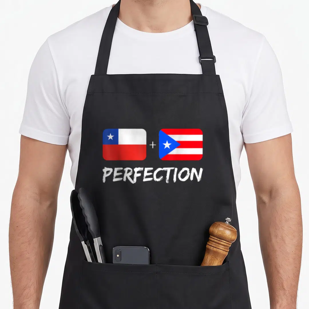 Chilean heritage aprons - Chile and Puerto Rico flags with plus sign and PERFECTION text — shown on a black cotton canvas apron against a white background