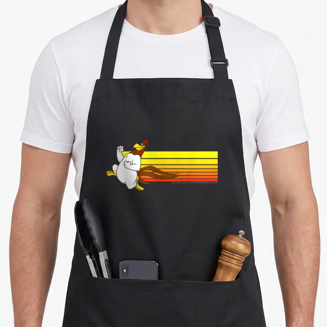 Leghorn looney tune apron - Cartoon rooster running right over yellow red and brown horizontal stripes — shown on a black cotton canvas apron against a white background