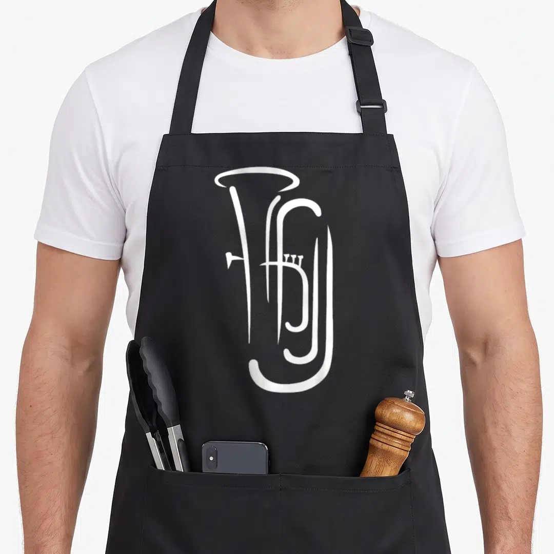 Funny tuba apron - White minimalist tuba silhouette centered on black background — shown on a black cotton canvas apron against a white background