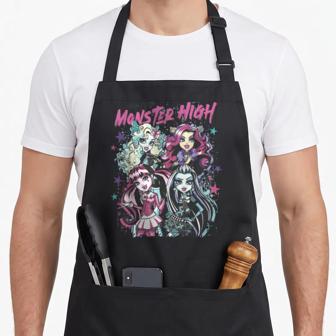 Graduate monster high apron - Four monster high characters below 2010 tour text with scattered stars in pink and teal — shown on a black cotton canvas apron against a white background