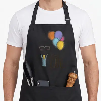 Carl couple apron - Cartoon man holding orange blue yellow purple balloons with Her CARL text overlay — shown on a black cotton canvas apron against a white background