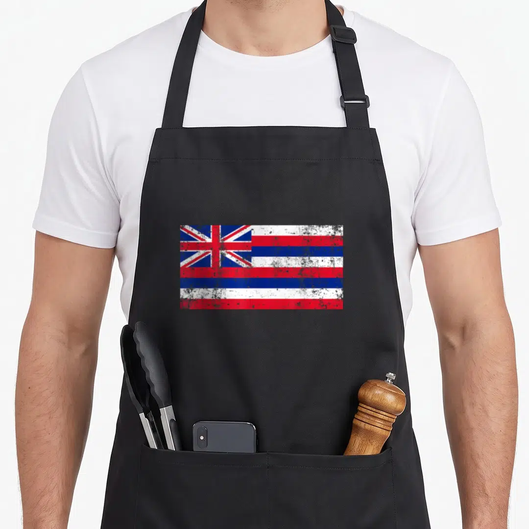 State hawaiian apron - Distressed red white and blue flag with Union Jack canton centered on background — shown on a black cotton canvas apron against a white background
