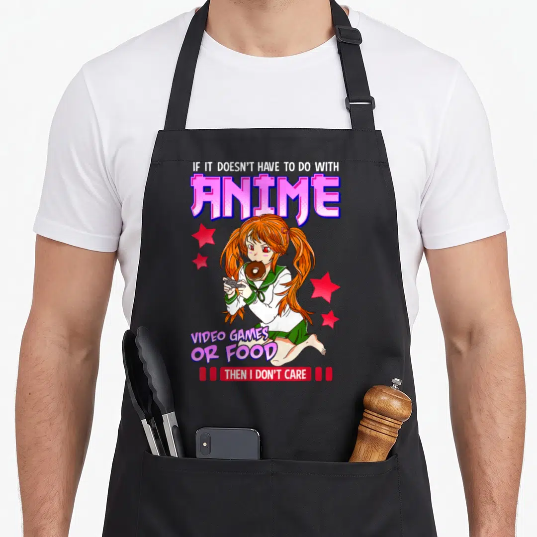 Care video game apron - Anime girl eating donut holding controller with text IF IT DOESN'T HAVE TO DO WITH ANIME VIDEO — shown on a black cotton canvas apron against a white background