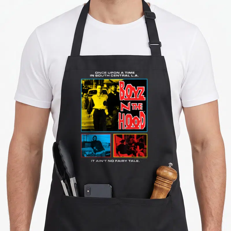 Boyz movie poster apron - Three men photo print with Once Upon a Time text and It Ain't No Fairy Tale quote in yellow — shown on a black cotton canvas apron against a white background