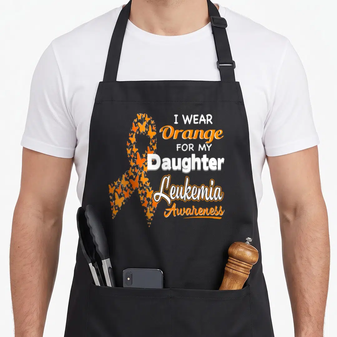 Funny daughter leukemia awareness apron - Orange butterfly awareness ribbon with text I WEAR Orange FOR MY Daughter — shown on a black cotton canvas apron against a white background