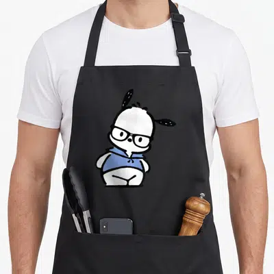 Pochacco nerd apron - Cartoon white dog wearing black glasses and a blue hoodie — shown on a black cotton canvas apron against a white background
