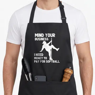 Mind money apron - White silhouette of person on pole with text about money for softball fees — shown on a black cotton canvas apron against a white background