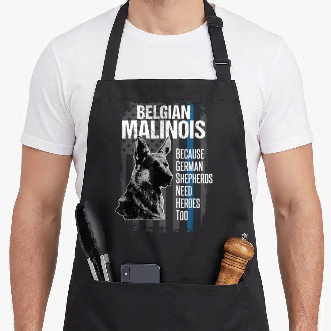 Dog police apron - Belgian Malinois profile with text Because German Shepherds Need Heroes Too and thin blue line — shown on a black cotton canvas apron against a white background