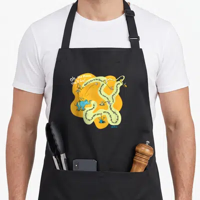 Youll game aprons - Blue elephant on roller skates with winding text on yellow abstract shape — shown on a black cotton canvas apron against a white background