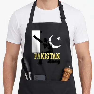 Pakistan cricket apron - Black cricketer silhouette with yellow PAKISTAN text over white flag elements — shown on a black cotton canvas apron against a white background