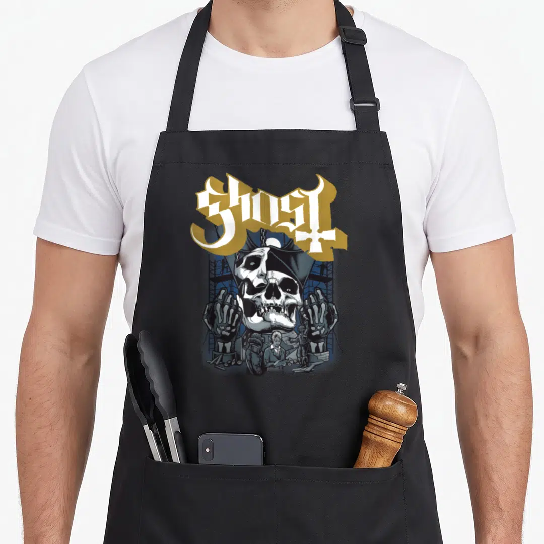 Construction ghost apron - Skull in hooded cape with gold GHOST text, two skeletal hands, scaffolding, grey white gold — shown on a black cotton canvas apron against a white background