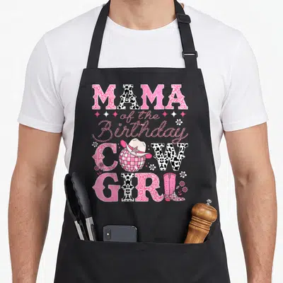 Bday cowgirl aprons - Mama of the Birthday Cowgirl text with disco ball cowboy hat and pink boot in pink and black — shown on a black cotton canvas apron against a white background