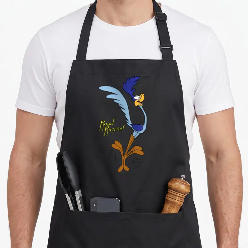 Runner portrait road apron - Cartoon Road Runner in blue yellow orange with text overlapping midsection — shown on a black cotton canvas apron against a white background