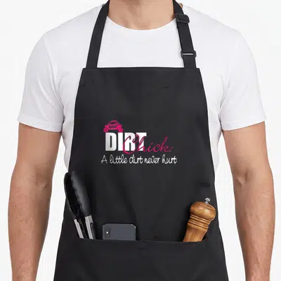 Sxs gear v neck apron - Pink off-road vehicle above white DIRT Chick text and A little dirt never hurt slogan — shown on a black cotton canvas apron against a white background