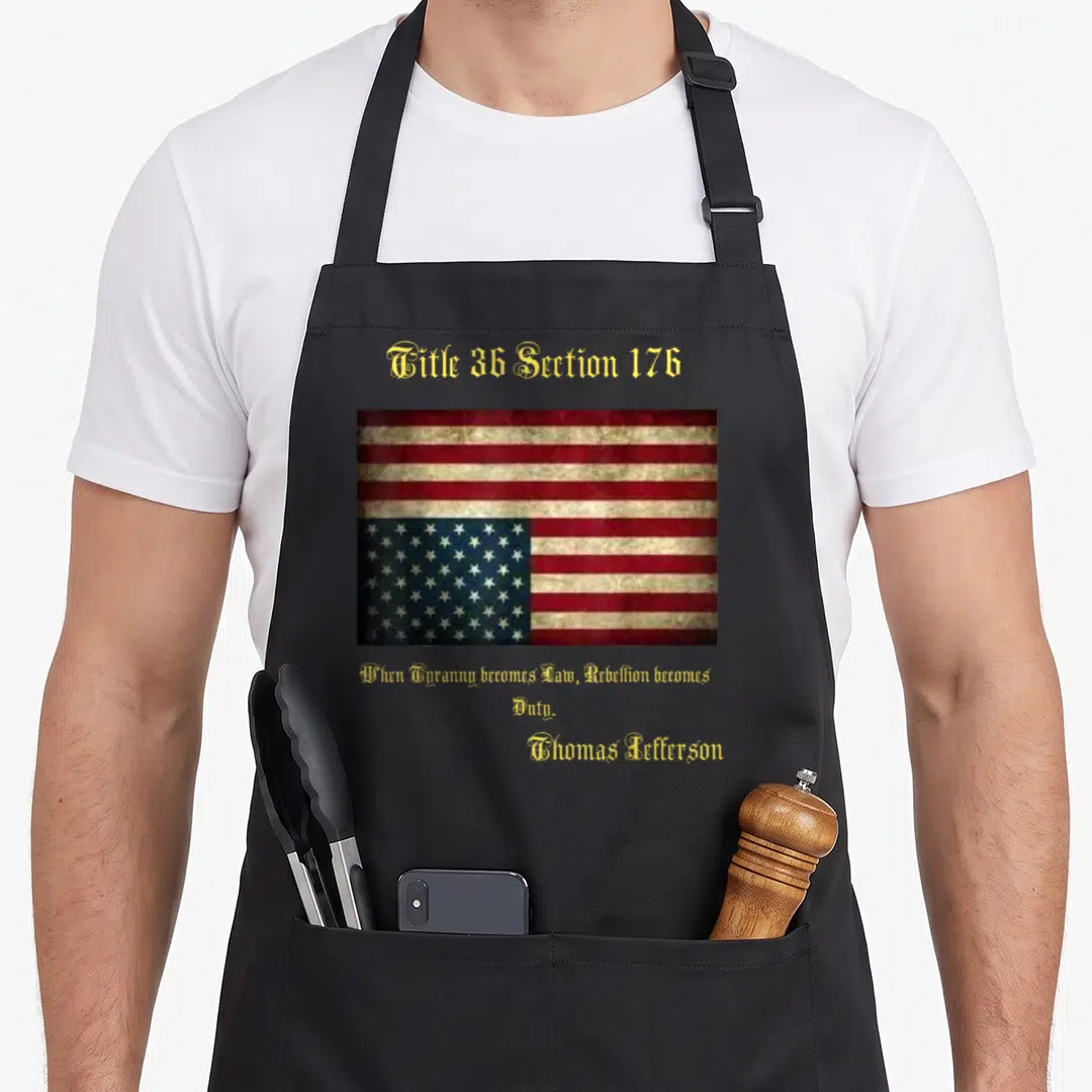 Distress american flag apron - Distressed USA flag with Title 36 Section 176 and Thomas Jefferson quote in gold text — shown on a black cotton canvas apron against a white background