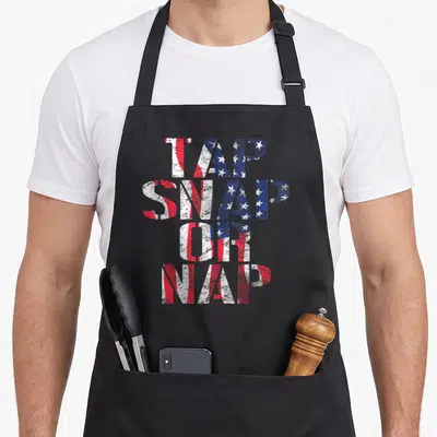 Bjj american flag apron - Distressed red white and blue typography reading TAP SNAP OR NAP stacked vertically — shown on a black cotton canvas apron against a white background