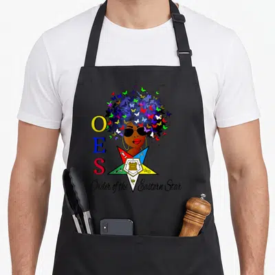 Eastern masonic apron - OES letters butterfly afro woman star emblem Order of the Eastern Star — shown on a black cotton canvas apron against a white background