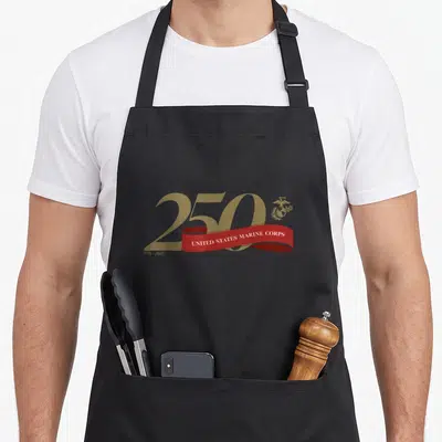Marine birthday apron - Gold 250 typography with red ribbon reading United States Marine Corps and small emblem — shown on a black cotton canvas apron against a white background