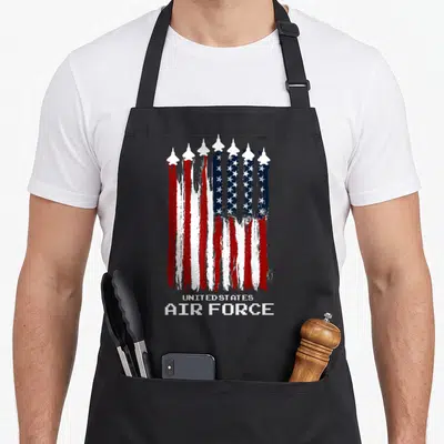 Air force 4th of july apron - Distressed vertical paint drip USA flag with seven flying jets and UNITED STATES AIR — shown on a black cotton canvas apron against a white background