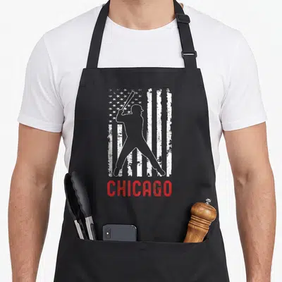 Chicago american flag apron - White baseball player silhouette over distressed flag with red Chicago text — shown on a black cotton canvas apron against a white background