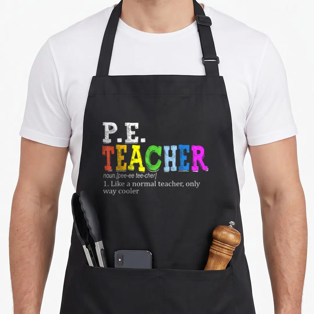 Definition personalized teacher aprons - P.E. TEACHER dictionary definition print in white, red, yellow, green, blue — shown on a black cotton canvas apron against a white background