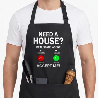 Funny broker real estate agent apron - Smartphone call screen print with red and green buttons and text NEED A HOUSE — shown on a black cotton canvas apron against a white background